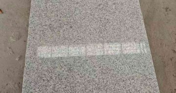 云南芝麻白光面毛板